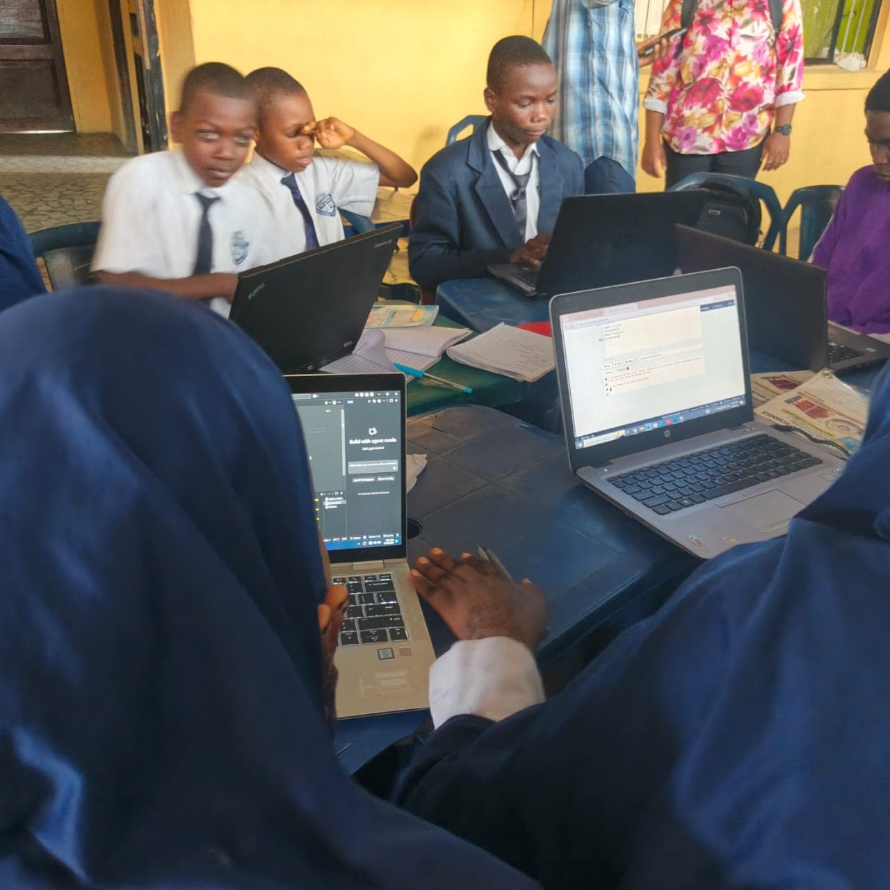 Students using laptops during an ICT learning session