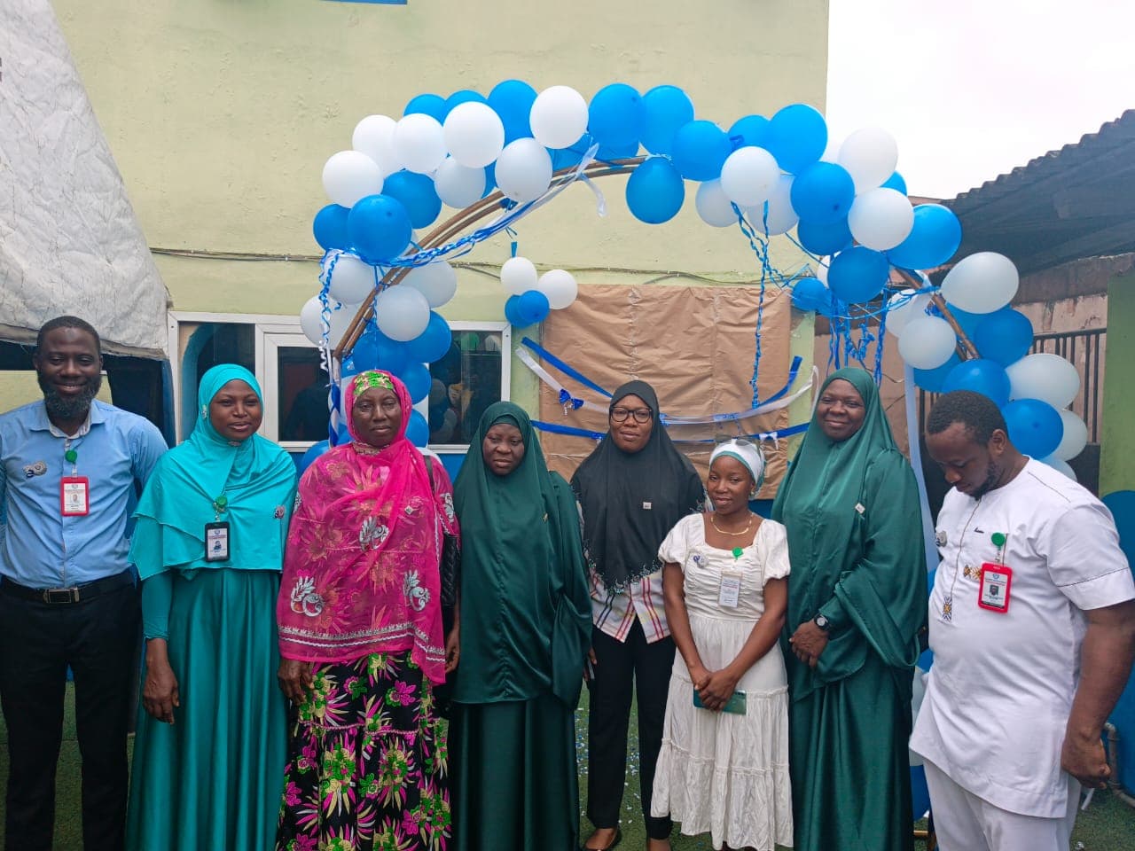 Sulaiman Shado Schools staff and students at a community event